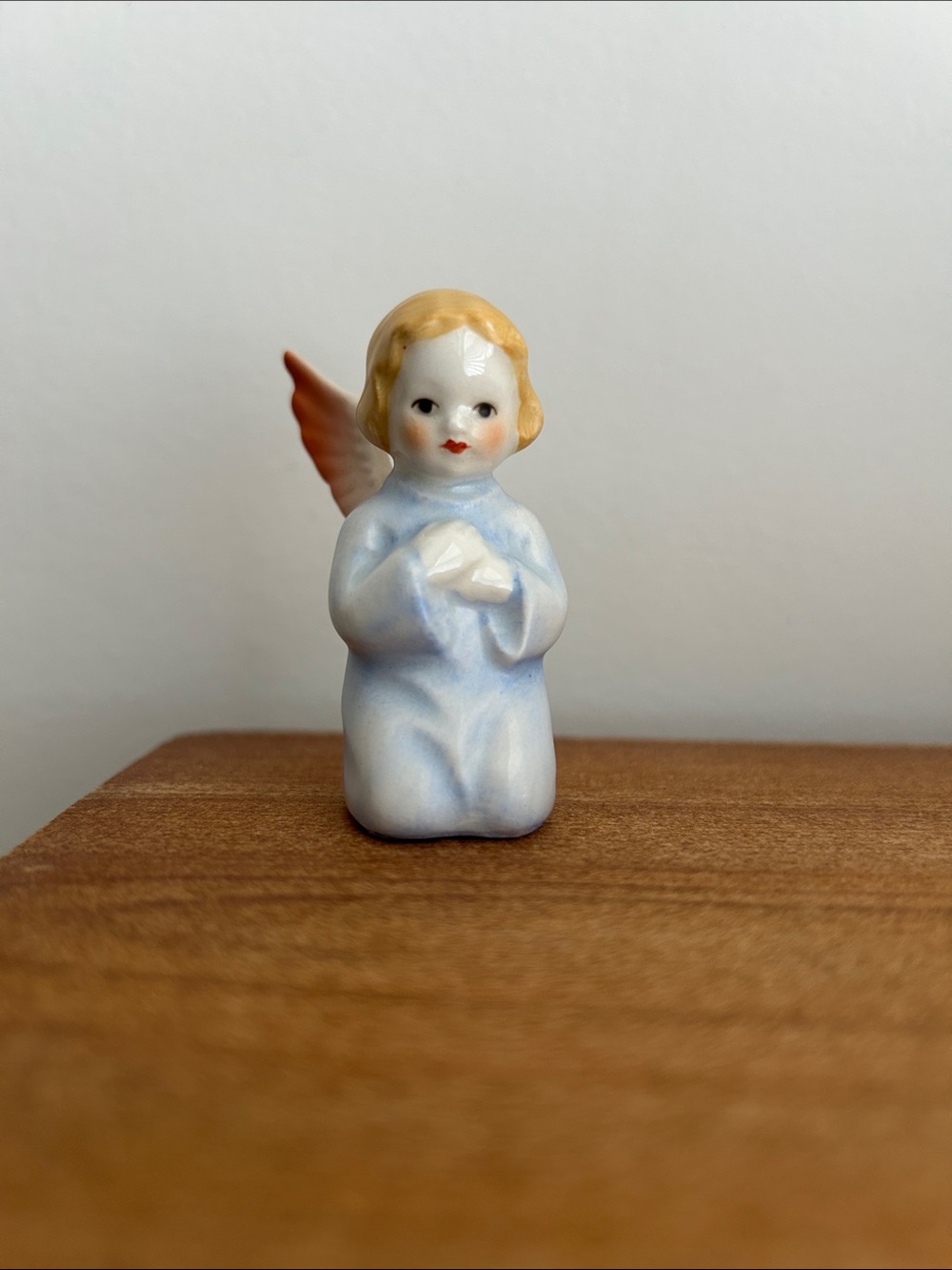 Vintage Goebel West Germany kneeling, praying angel in pastel blue, Patt
